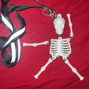 Glow in the dark skeleton hand sanitizer holder